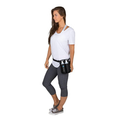 EarthLite holster worn by therapist with bottles in use for faster, spill-reduced service