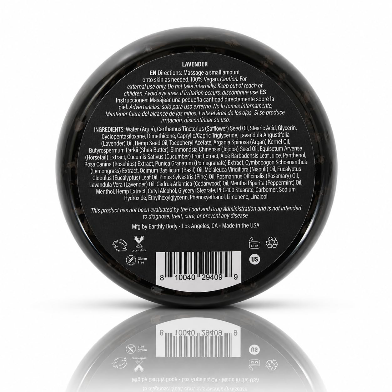 Earthly Body 5oz jar next to coin for scale demonstrating travel-friendly size