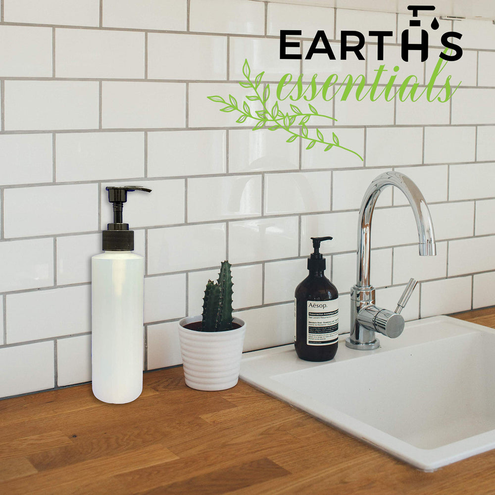 Earth's Essentials bottles arranged on salon counter for professional use