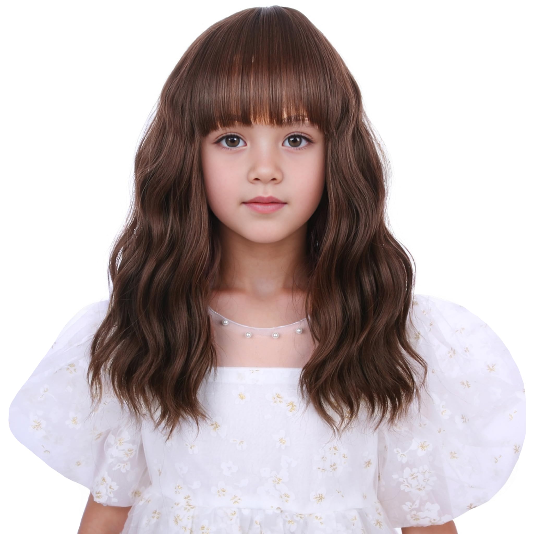 Edivd front view showing natural mixed brown color and flattering short cut