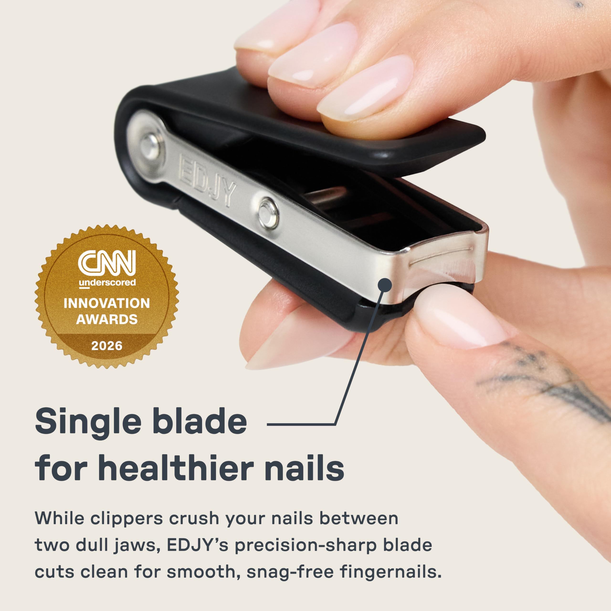 EDJY close-up of curved blade showing surgical-grade edge for clean cuts