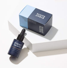 Eight Saints dropper dispensing clear oil demonstrating precise application