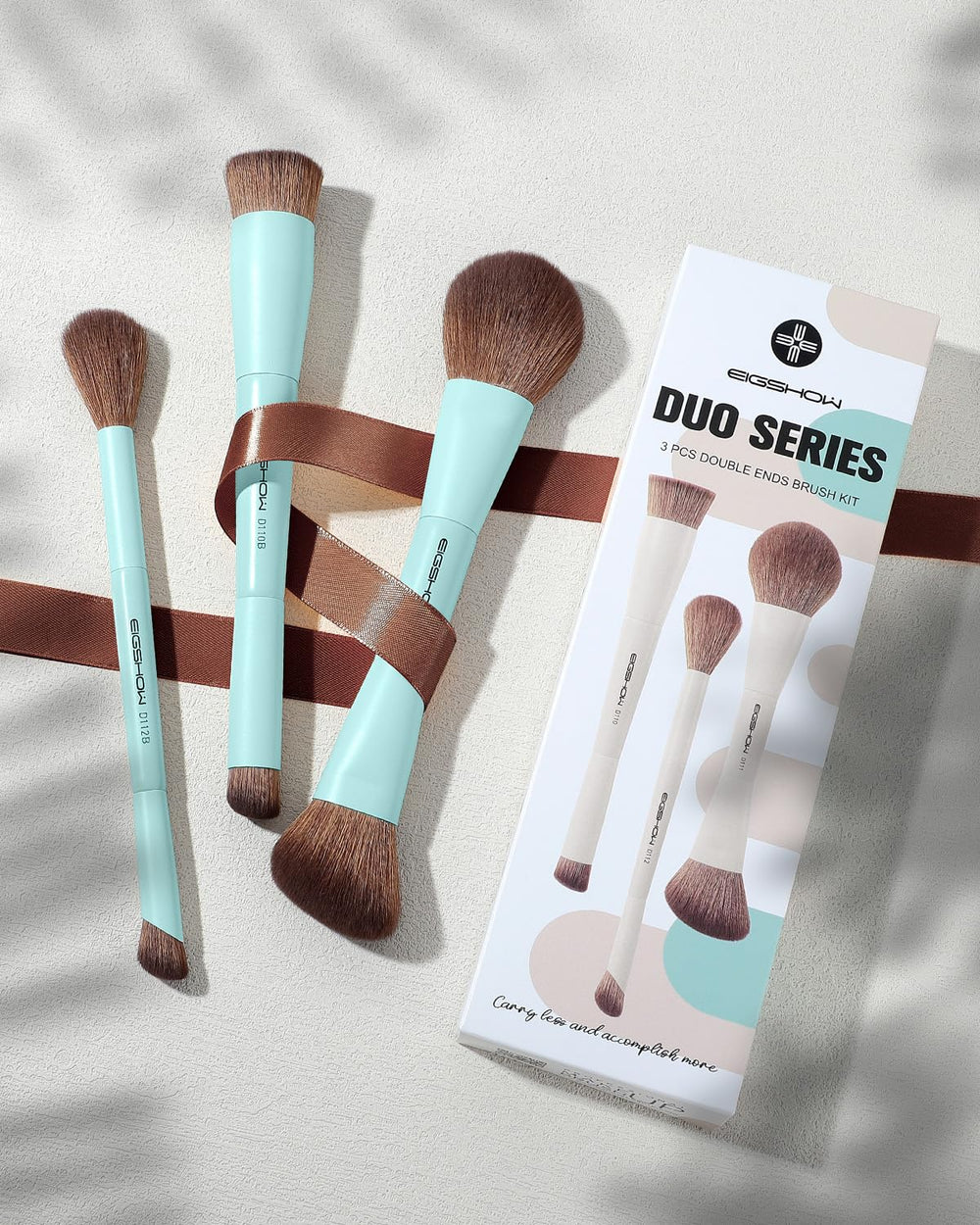 EIGSHOW brushes held in hand showing scale and easy handling