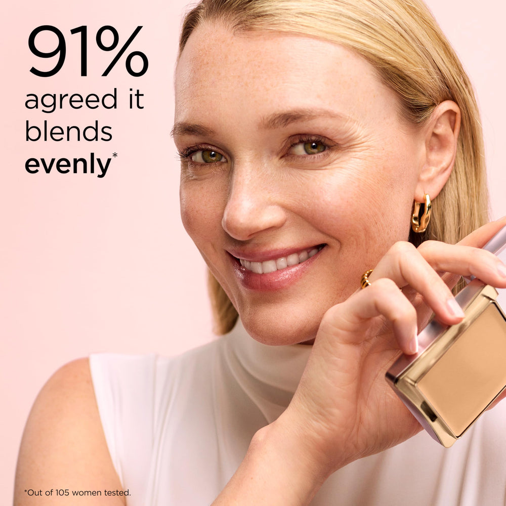 Elizabeth Arden compact held in hand to show size for travel-friendly convenience