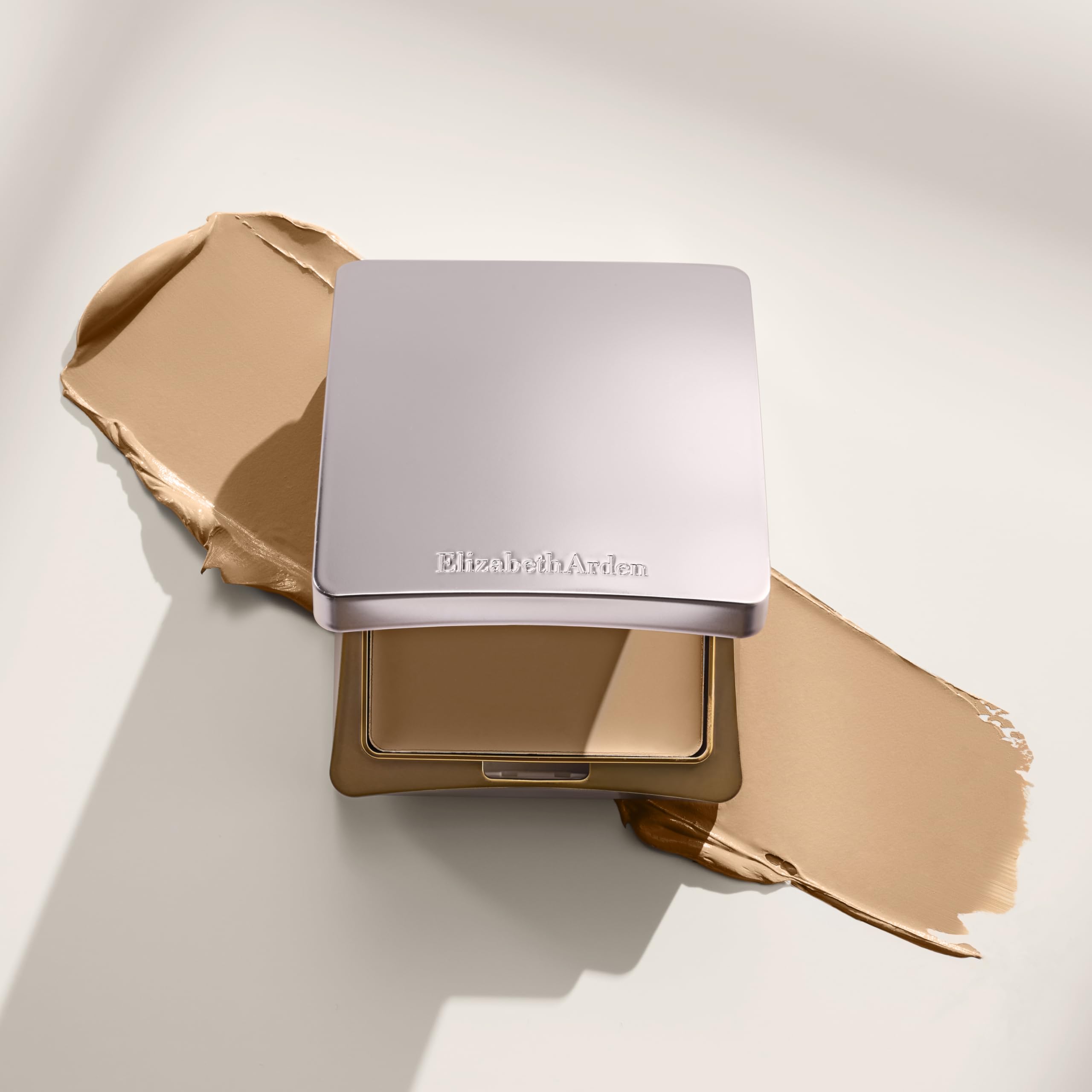 Elizabeth Arden close-up of creamy foundation texture demonstrating smooth blendability