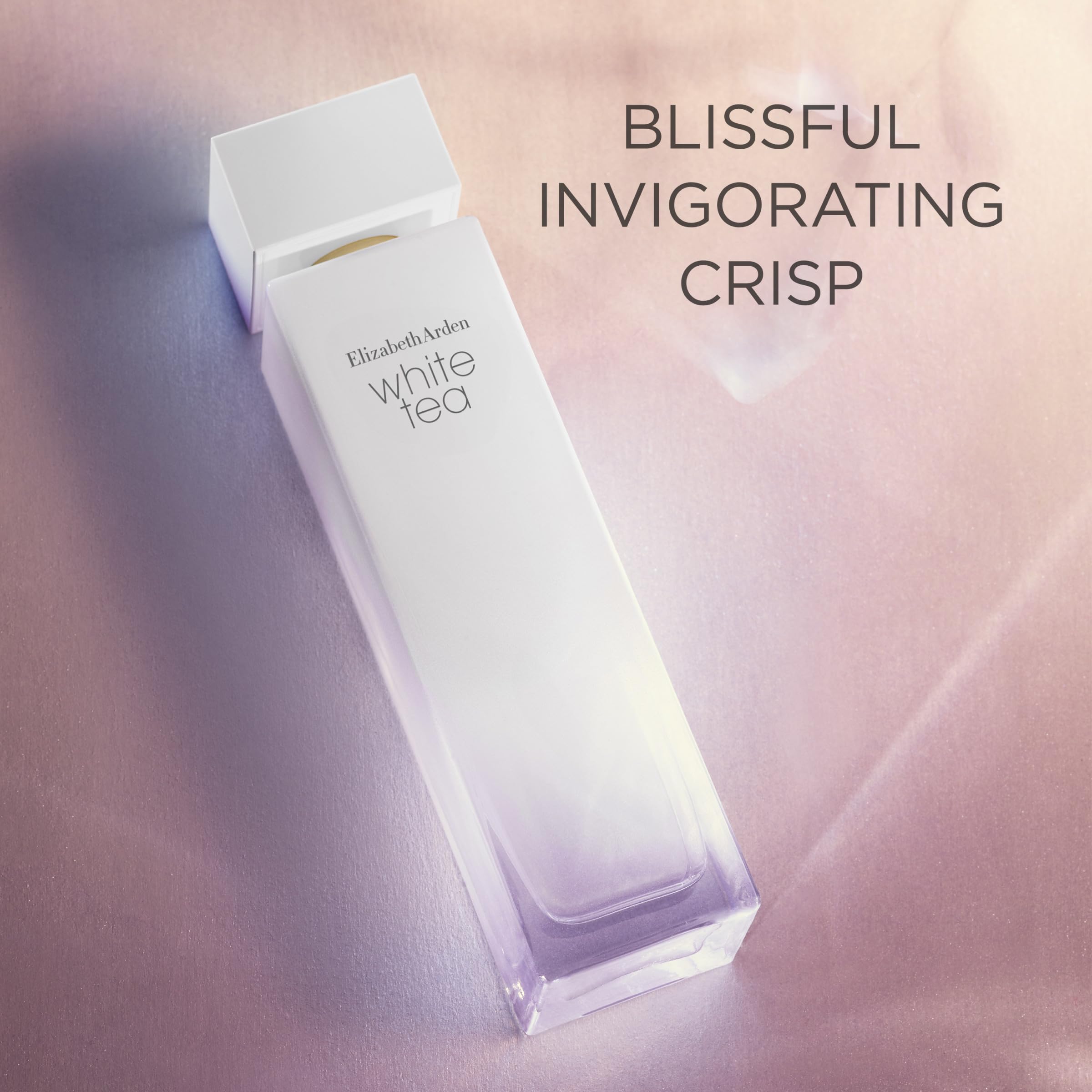 Elizabeth Arden White Tea deodorant held in hand for scale showing portable 1.3 fl oz convenience