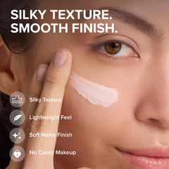 Elizabeth Mott fingertip applying primer demonstrating lightweight glide and smooth base benefit