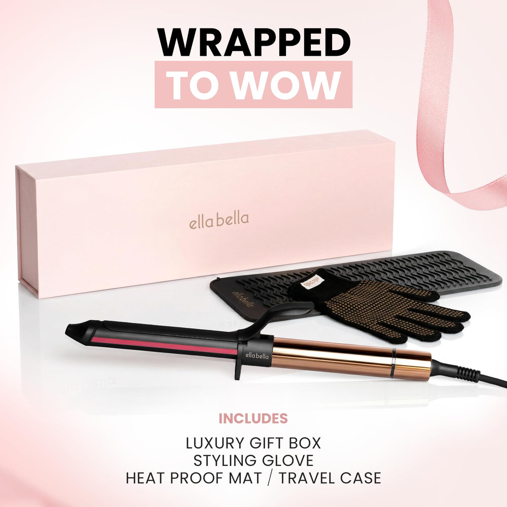 ELLA BELLA wand held in hand to show compact size and comfortable grip for control