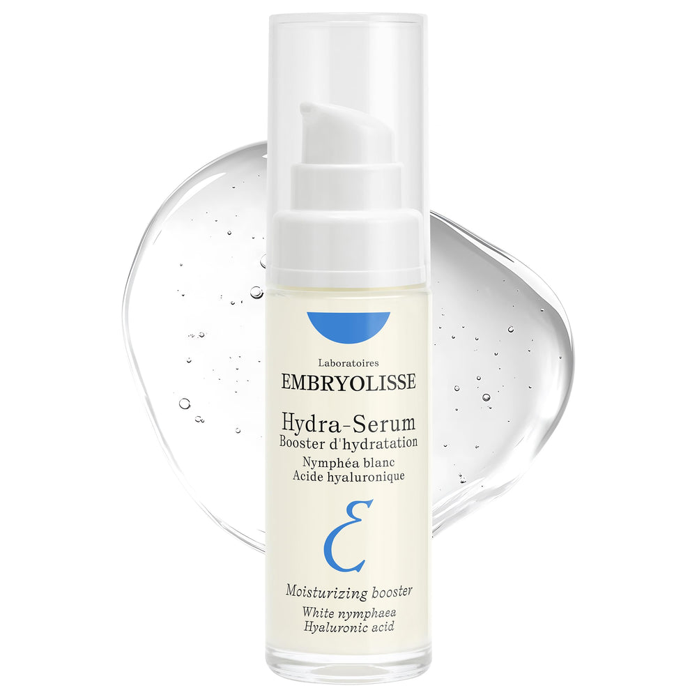 Embryolisse bottle beside a common object showing 1.01 fl oz size and portability
