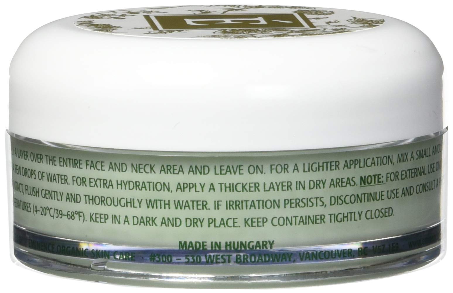 Eminence applying cream to face at night for overnight renewal