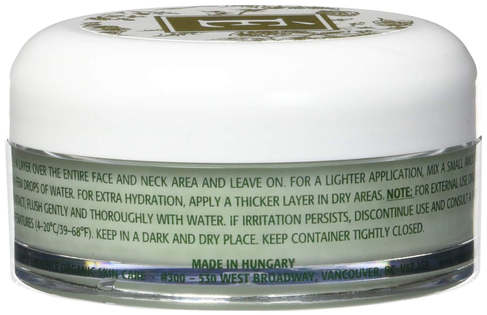 Eminence applying cream to face at night for overnight renewal