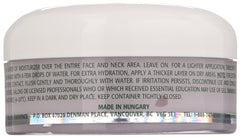 Eminence jar in hand for scale showing compact travel-friendly 2 fl oz