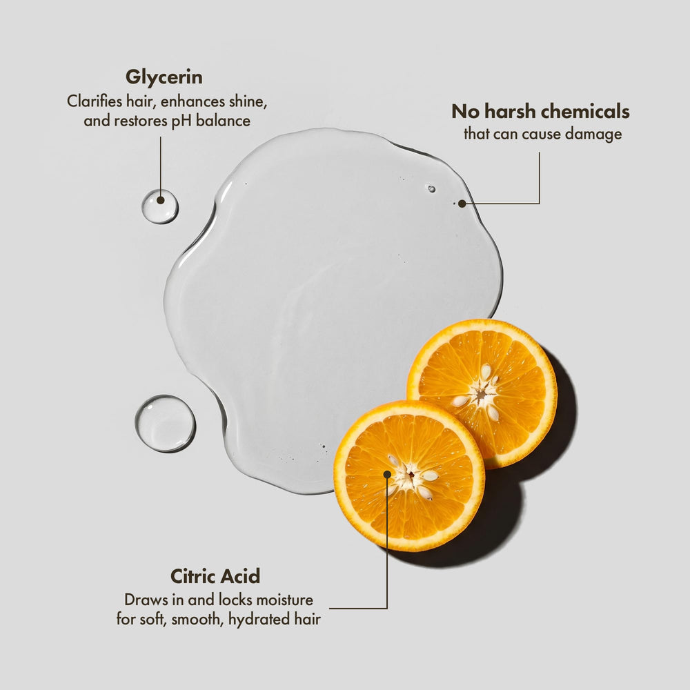 Enjoy curl enhancing spray close-up label highlighting ingredients and color-safe benefits for curls