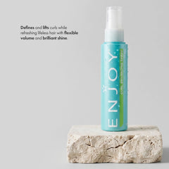 Enjoy curl enhancing spray misting action demonstrating even, lightweight application for natural lift