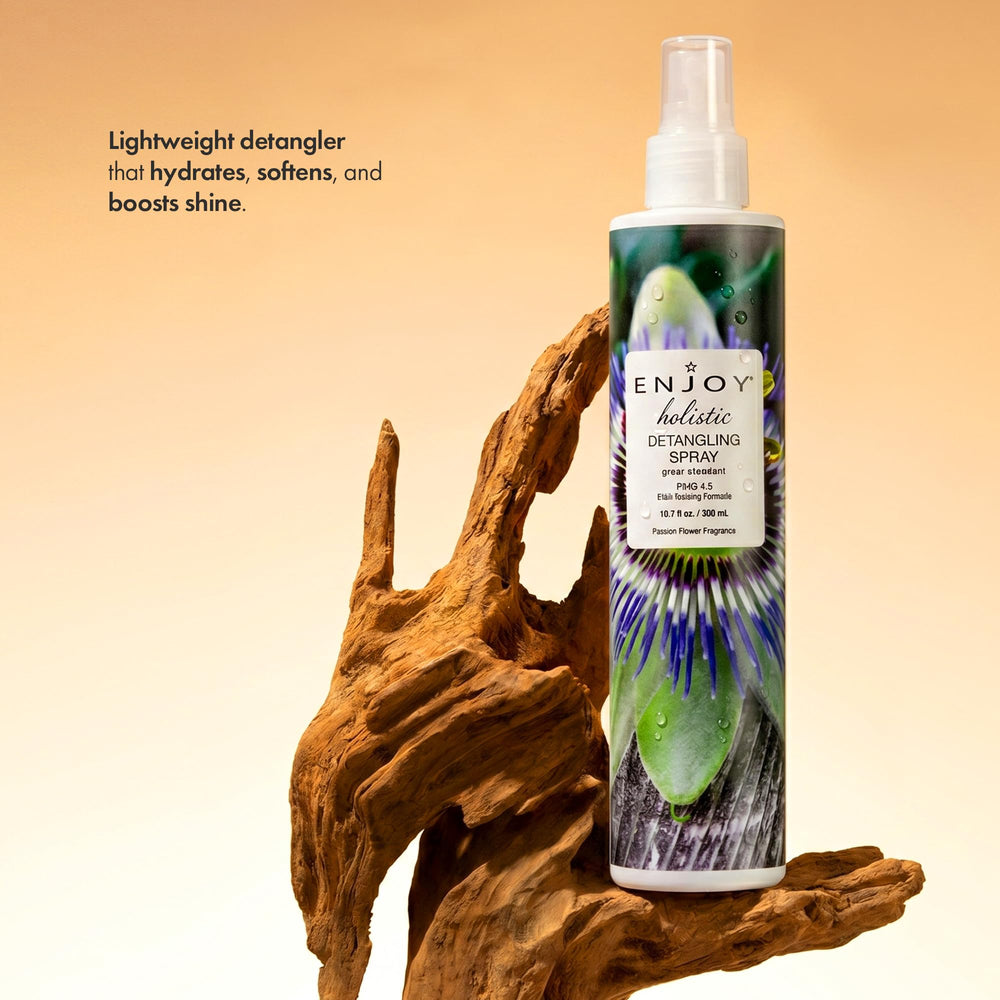 Enjoy detangler spray nozzle action demonstrating easy application