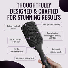 ERGO brush in hand demonstrating compact size for travel convenience