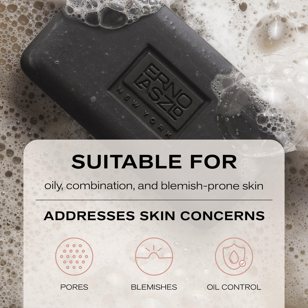 Erno Laszlo bar resting on soap dish indicating neat shower storage benefit