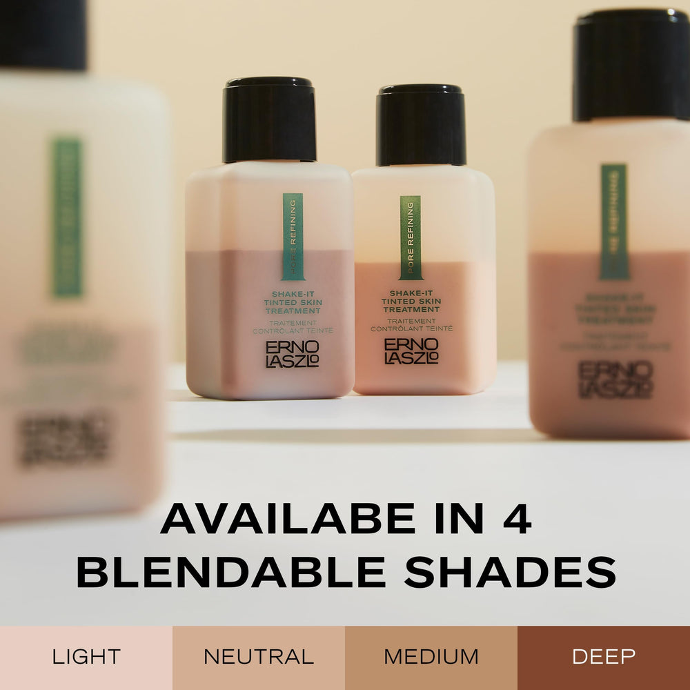 Erno Laszlo 90mL bottle next to everyday items showing travel-friendly benefit and scale