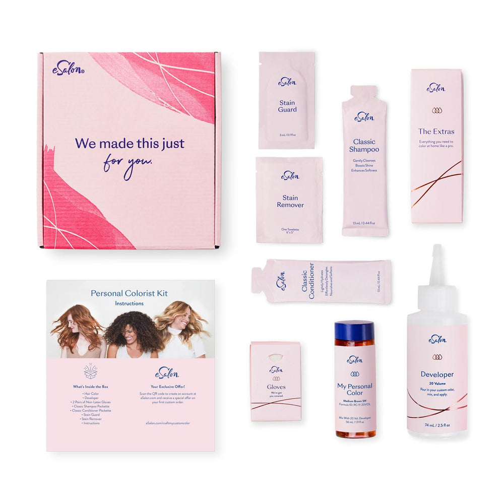 eSalon application gloves, stain guard, and sachets laid out for a clean at-home dye