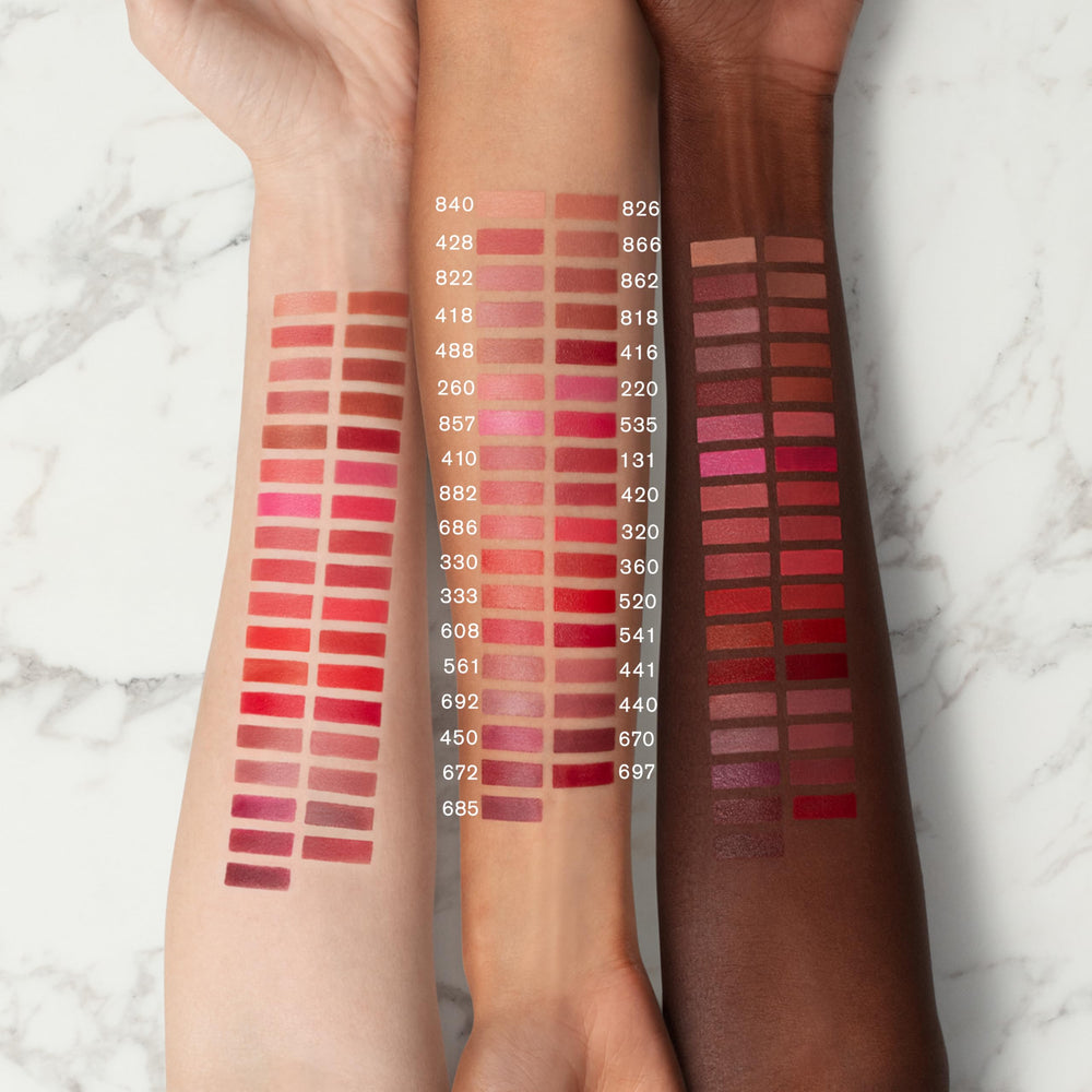Estée Lauder lipstick held in hand to indicate size and scale benefit: travel-friendly luxury