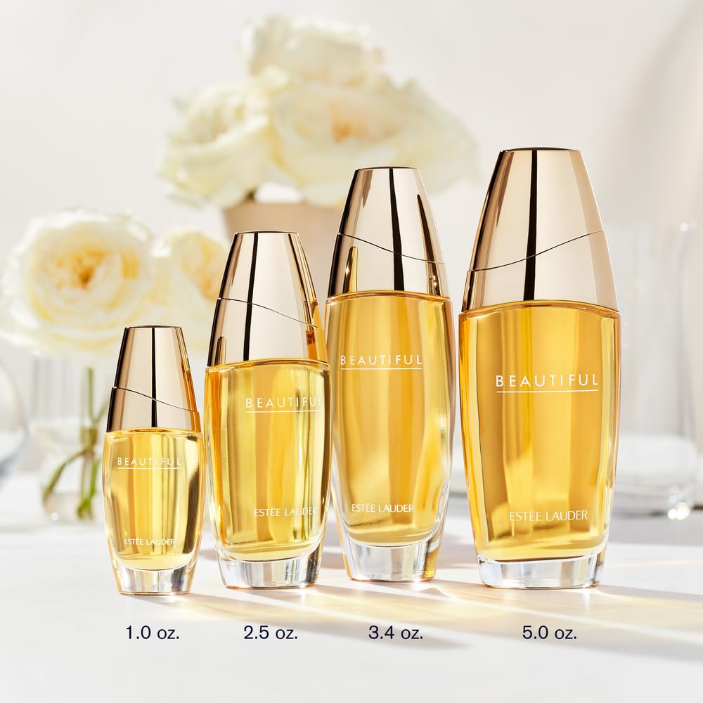 Estée Lauder bottle being sprayed to show application and mist benefit