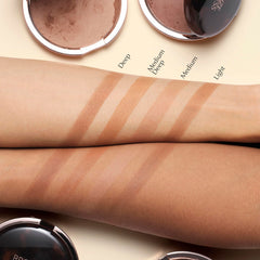 Estée Lauder swatch on arm demonstrating buildable color payoff benefit