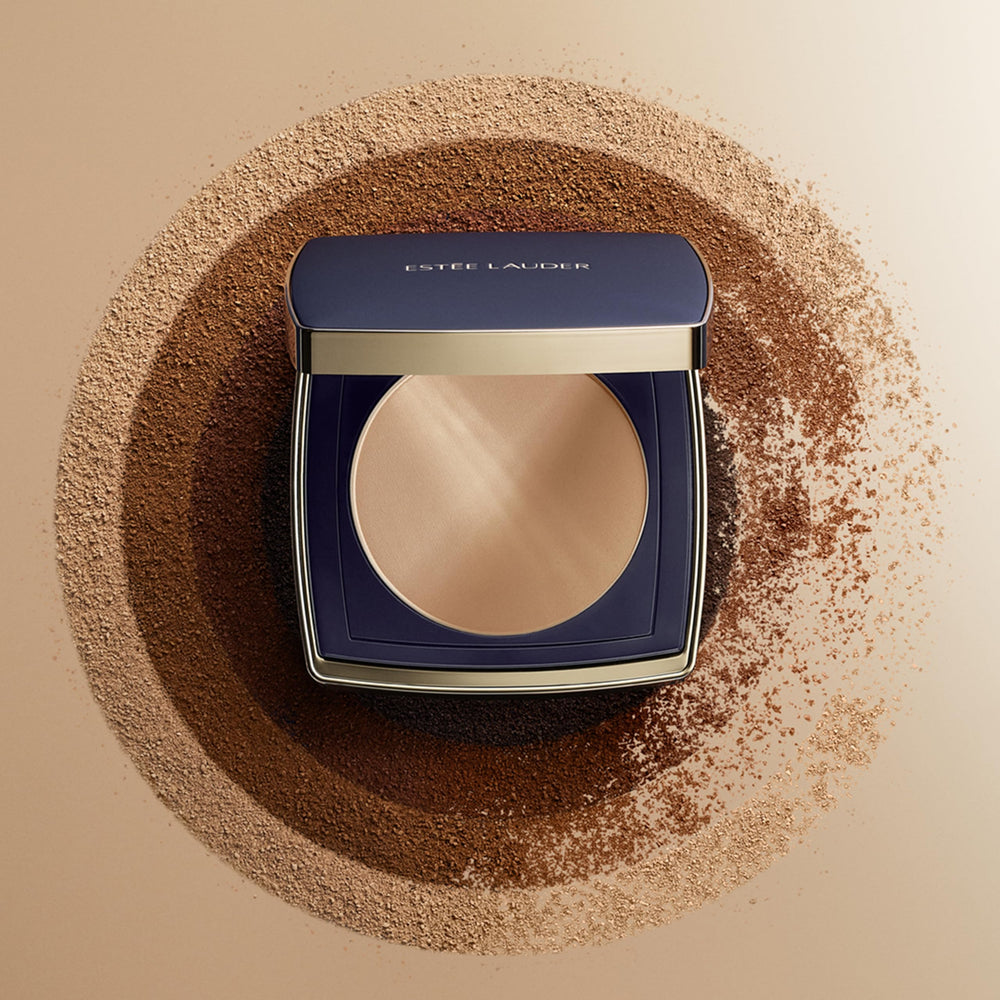 Estée Lauder compact beside smartphone to show scale benefit: travel-ready size