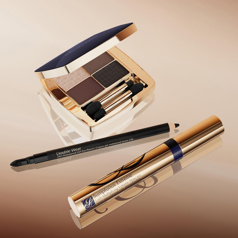 Estée Lauder Double Wear pencil alongside a coin for size and Espresso shade clarity