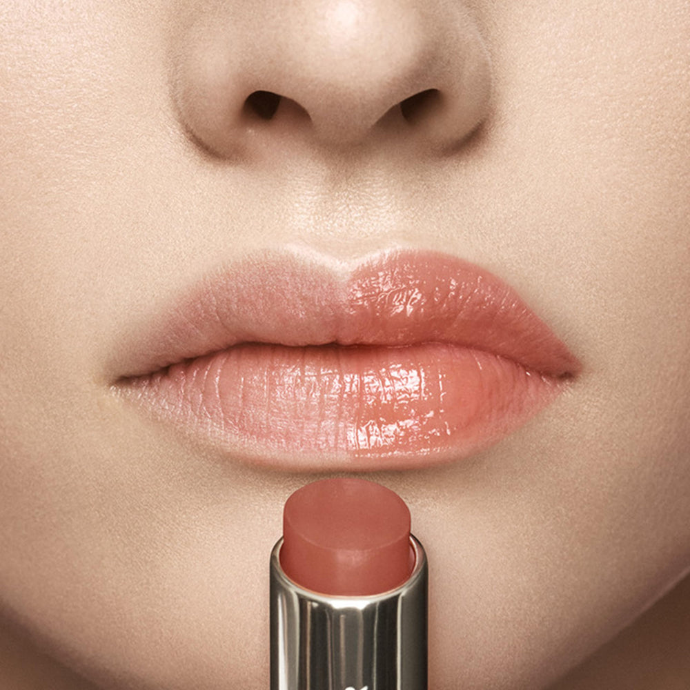 Estée Lauder open tube showing smooth balm texture for easy glide and comfort