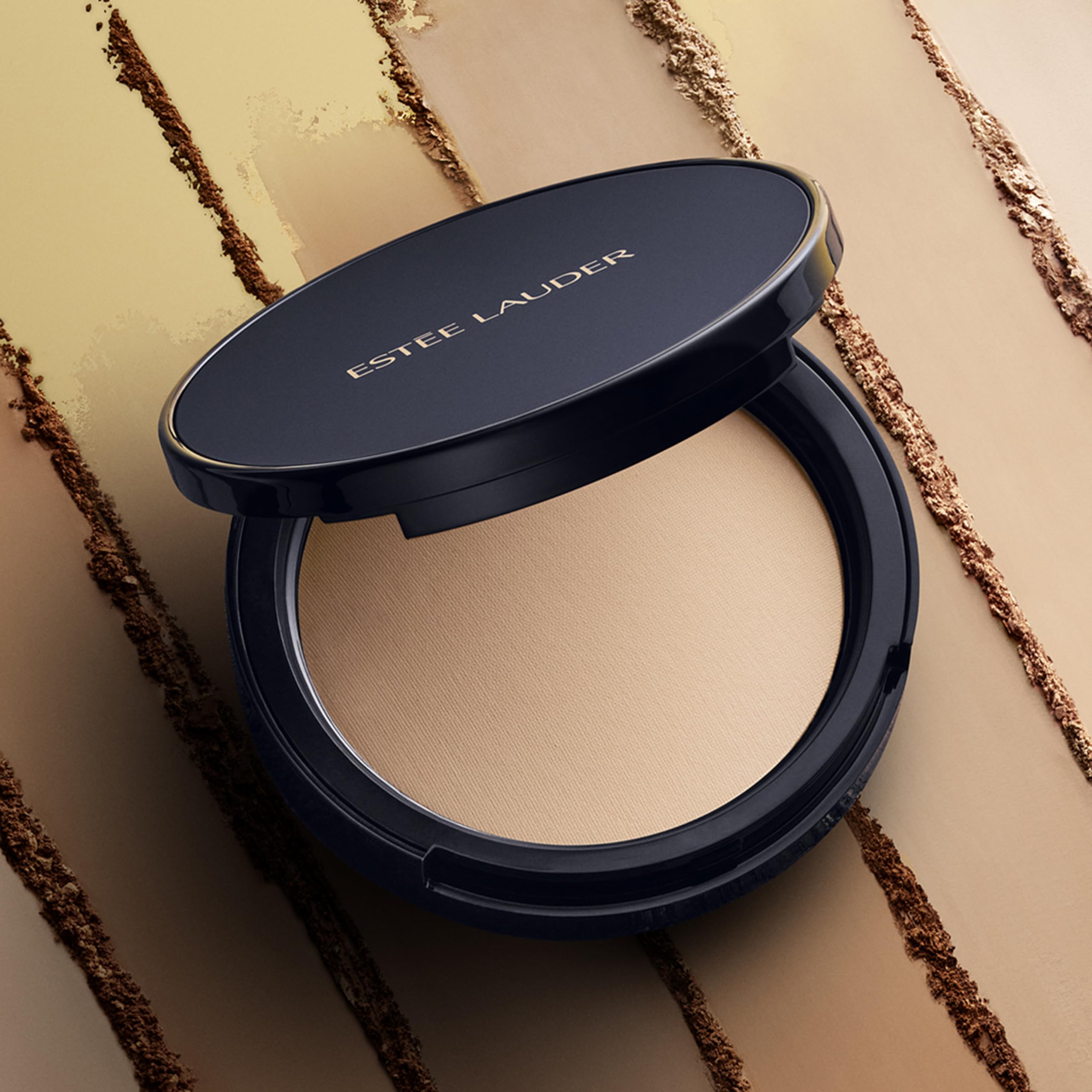 Estée Lauder lifestyle desk touchup showing quick mattifying benefit during day