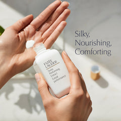 Estée Lauder applying lotion to face to show easy absorption and comfort