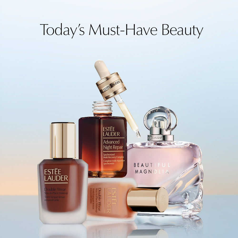 Estée Lauder in-use lifestyle mist over finished makeup for instant refresh and glow