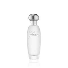 Estée Lauder Pleasures front bottle showing elegant glass and soft glow benefit of display