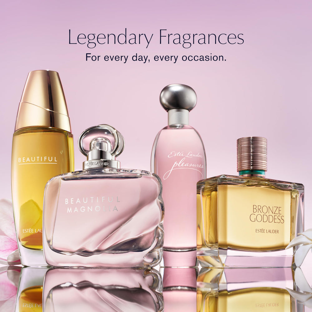 Estée Lauder Pleasures on vanity with flowers illustrating everyday elegance and mood boost