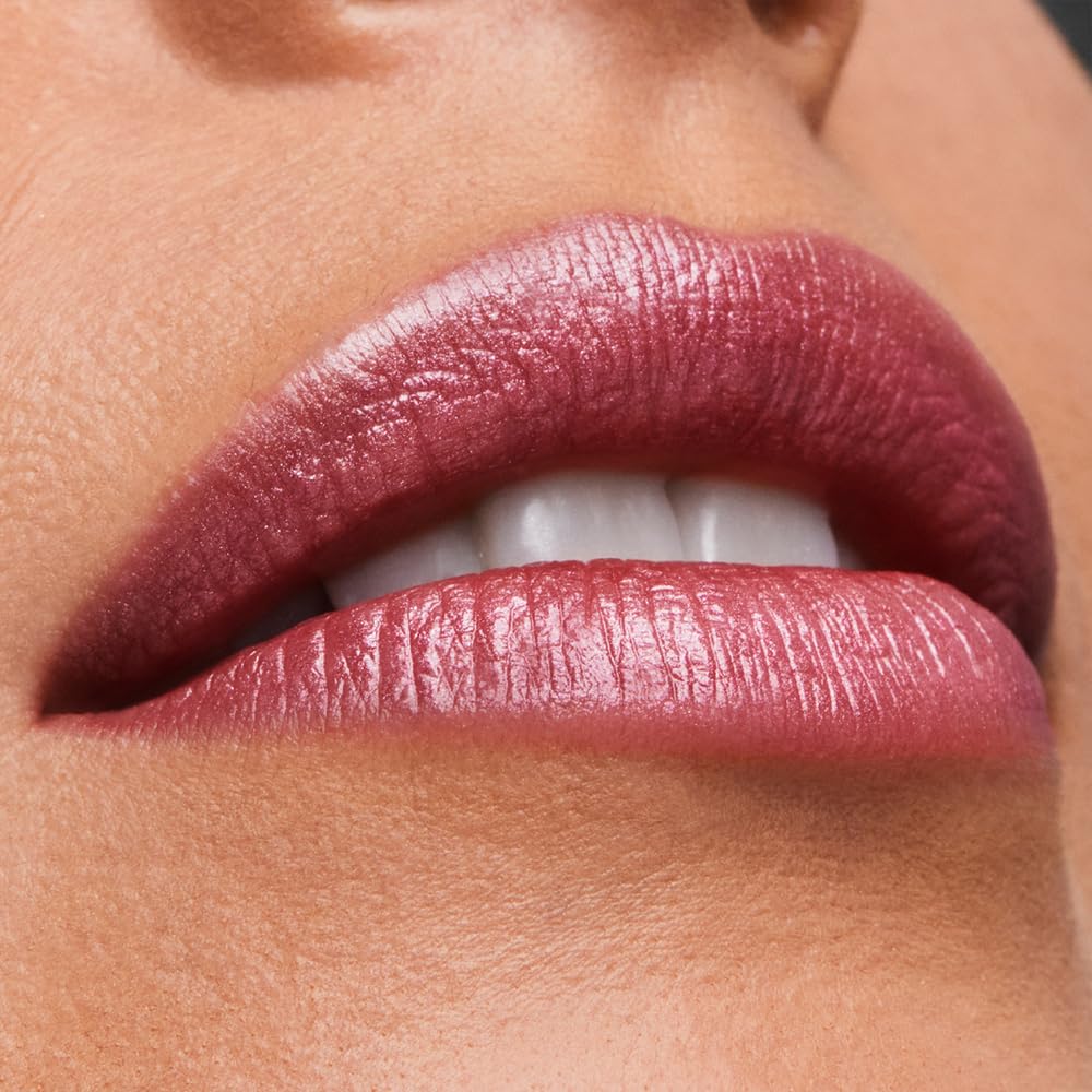 Estée Lauder swatch texture on arm showing shimmer finish and nourishing sheen