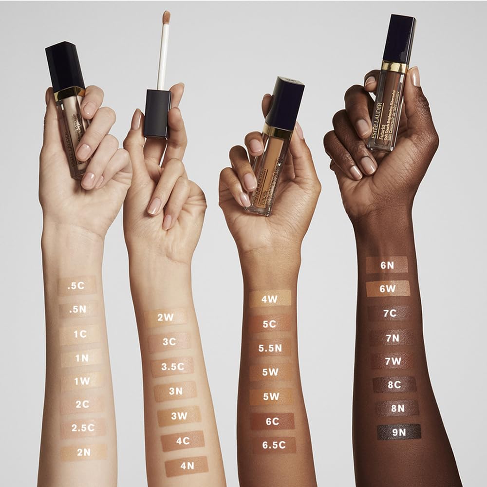 Estée Lauder shade 2N droplet beside ruler to show size and coverage scale