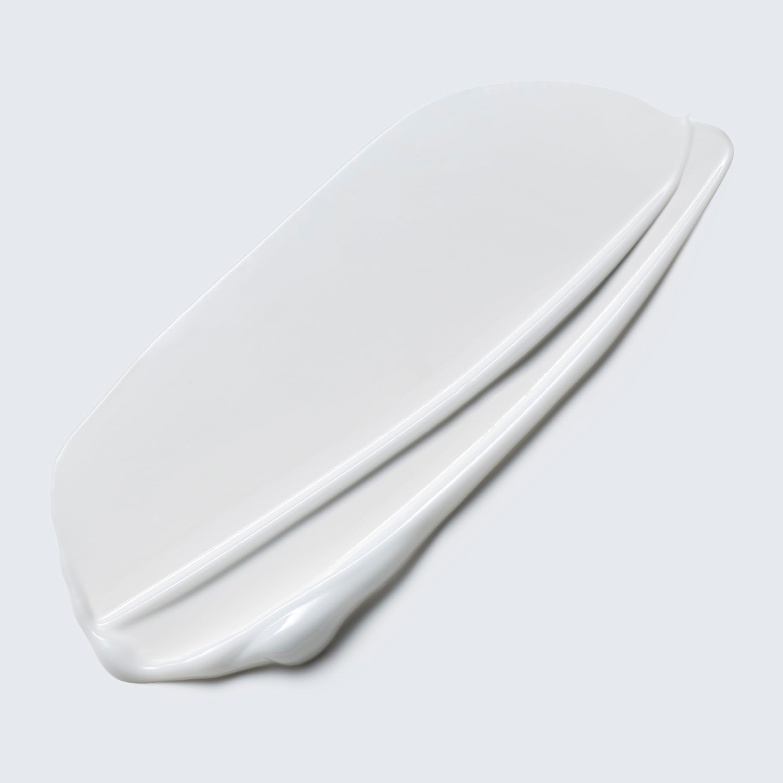 Estée Lauder lotion texture closeup highlighting lightweight water-based finish