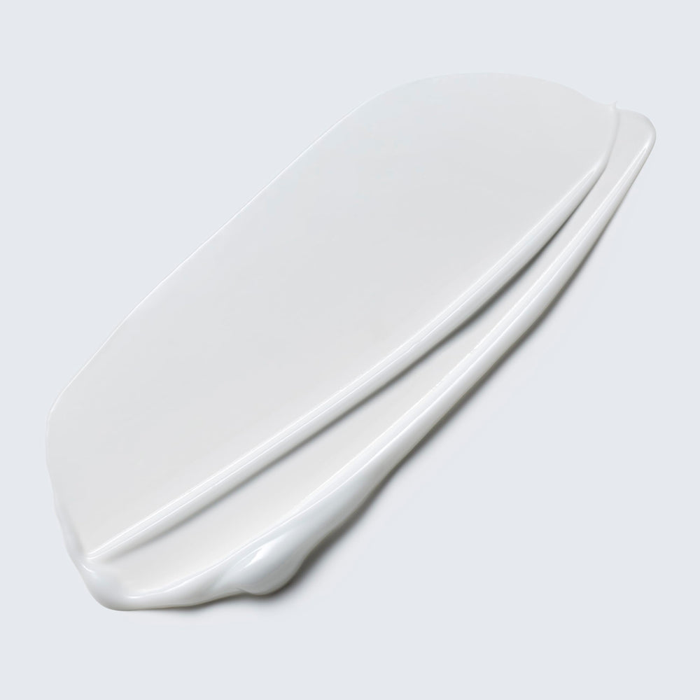 Estée Lauder lotion texture closeup highlighting lightweight water-based finish