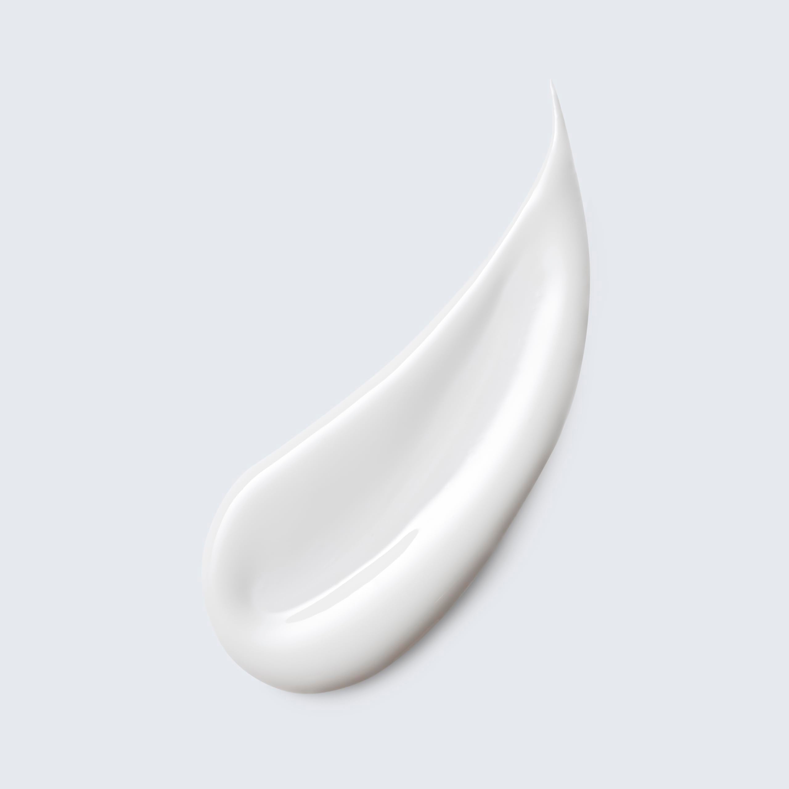 Estée Lauder milky lotion texture close-up demonstrating smooth, hydrating finish