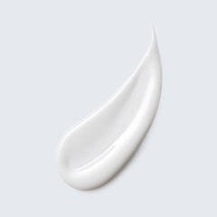 Estée Lauder milky lotion texture close-up demonstrating smooth, hydrating finish