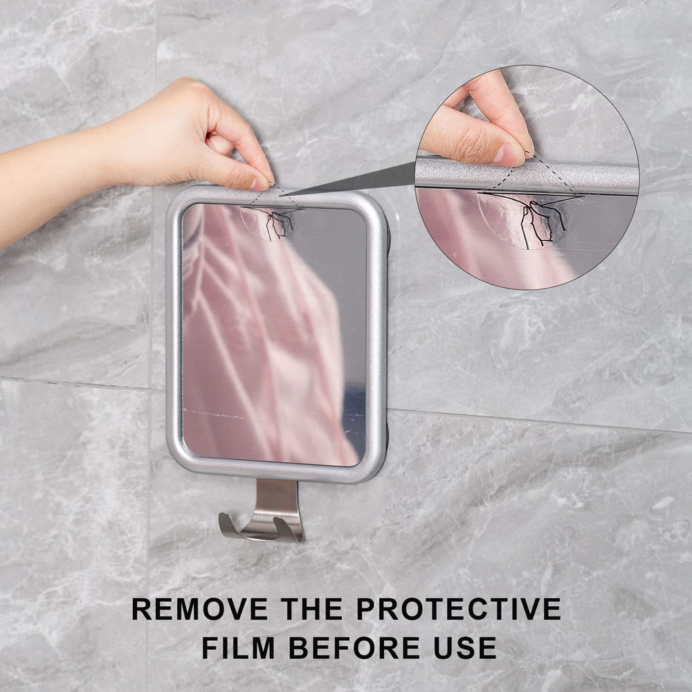 Ettori mirror mounted in shower for fogless shaving convenience