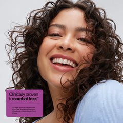 EVA·NYC conditioner texture close-up showing creamy slip for detangling