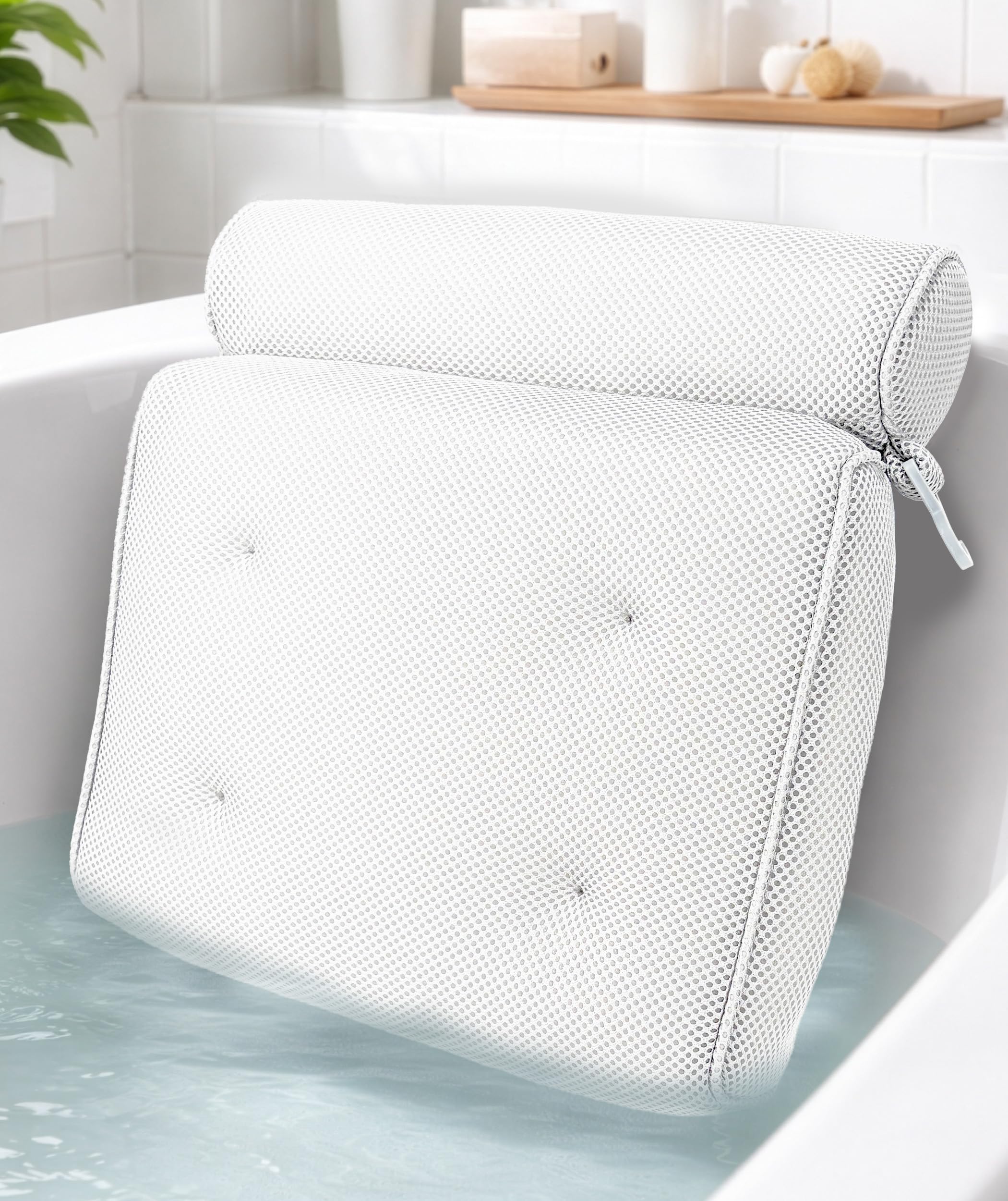 Everlasting Comfort front-facing white pillow shown on tub rim for supportive comfort
