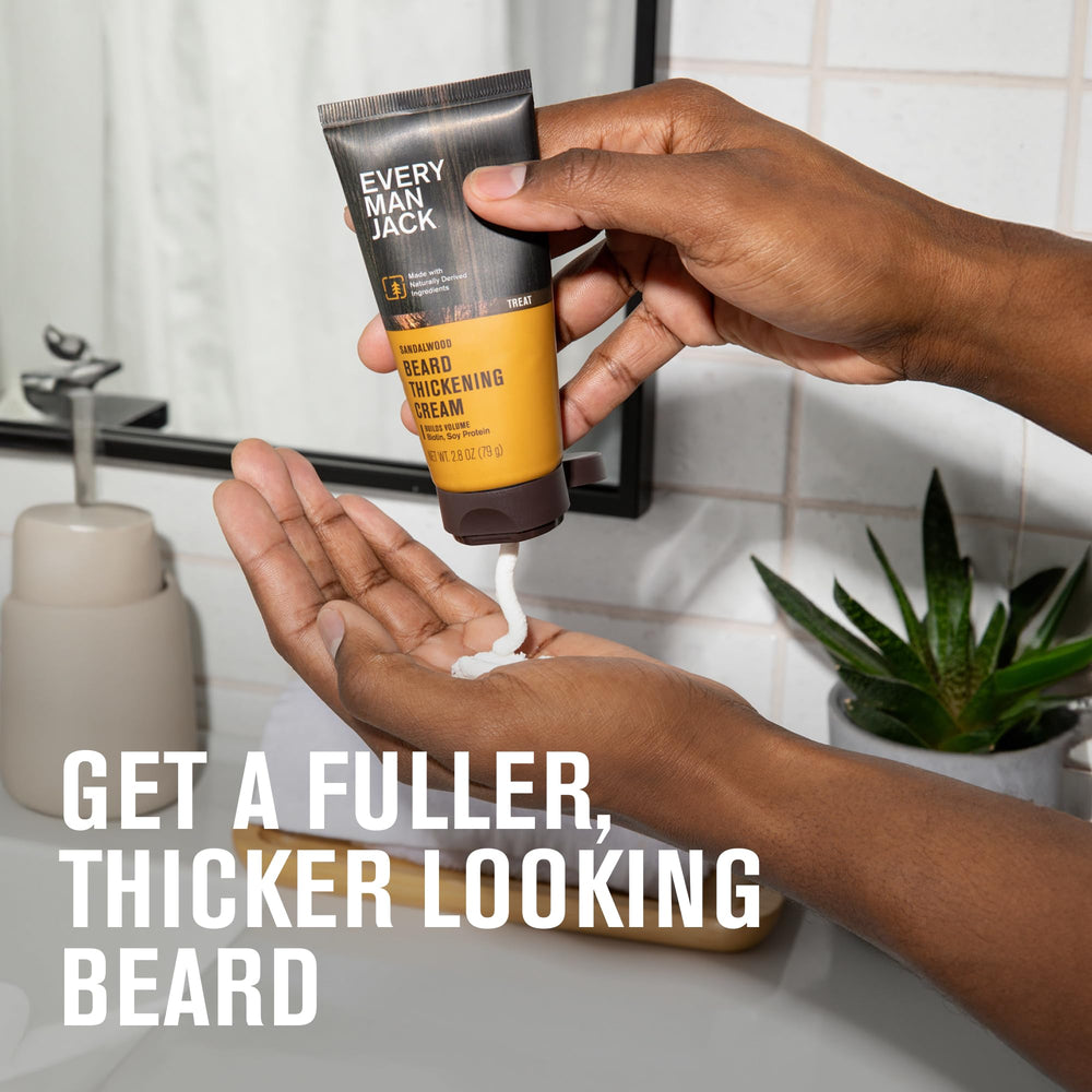 Every Man Jack applying cream to beard for added body and easier styling