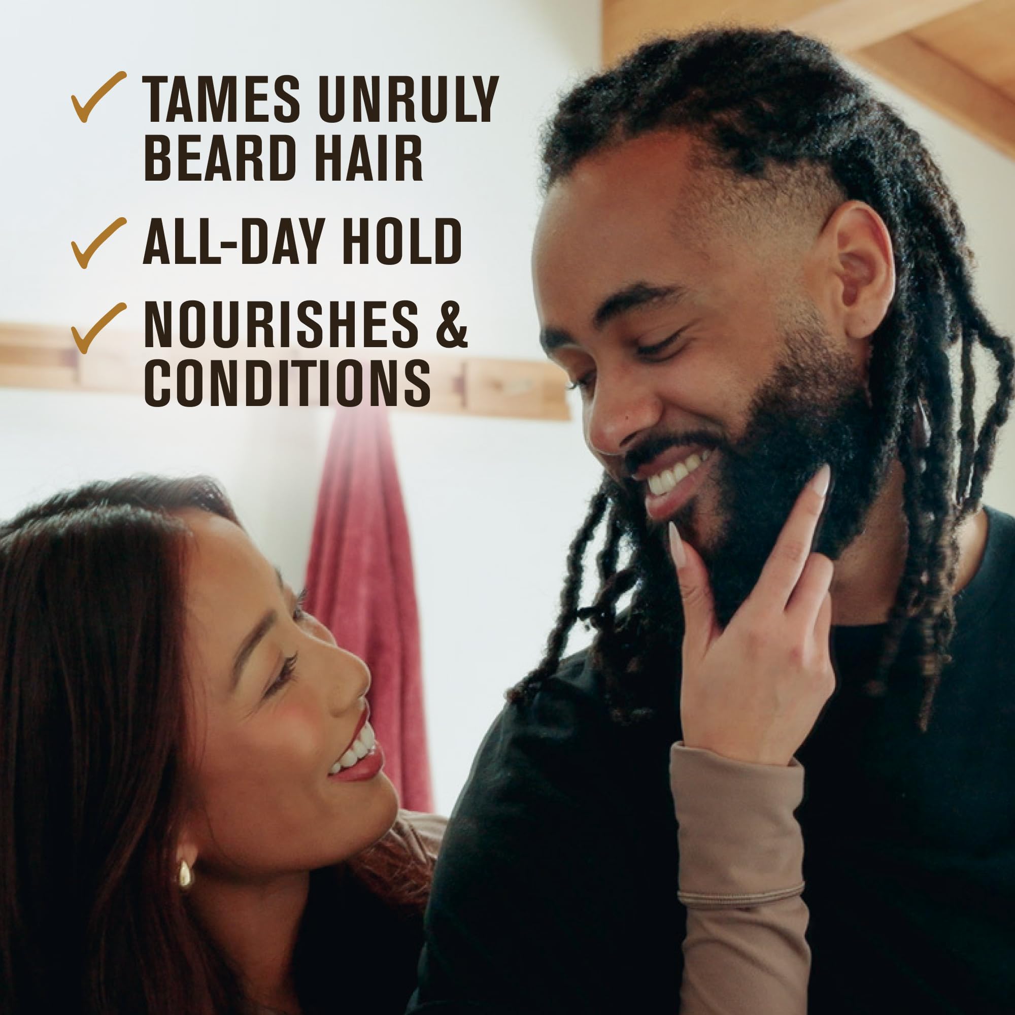 Every Man Jack balm on hand ready to apply for manageable, conditioned beard