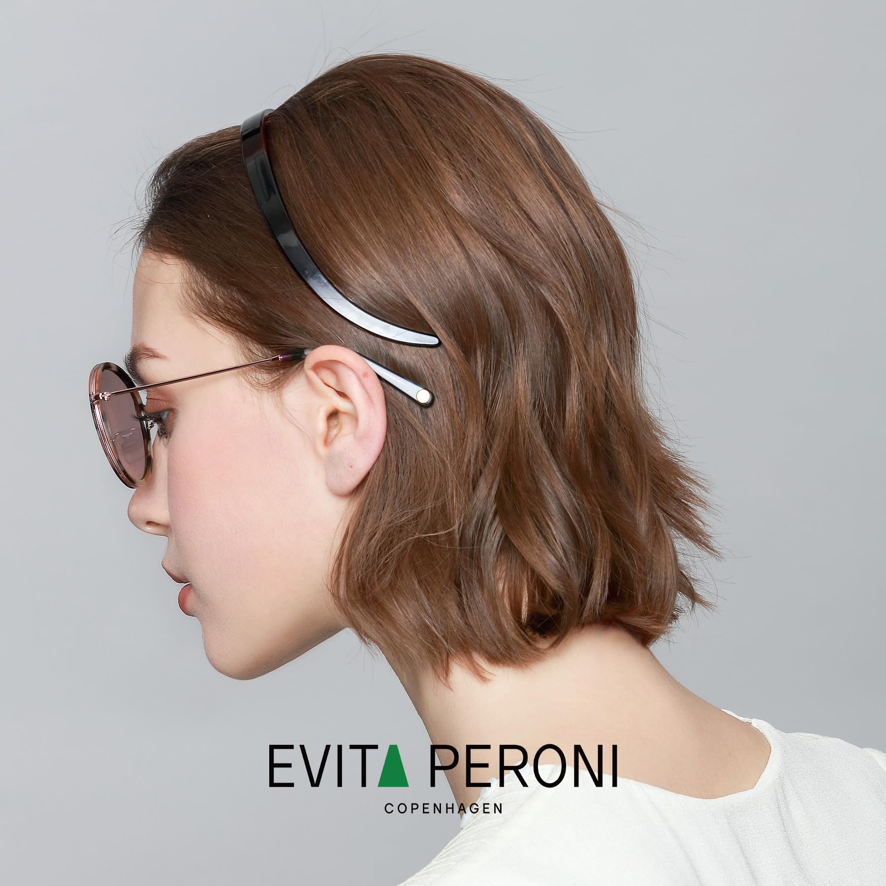 EVITA PERONI close-up of acetate texture highlighting shine and durable elasticity