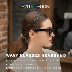 EVITA PERONI headband worn with eyeglasses demonstrating eyewear-friendly design benefit