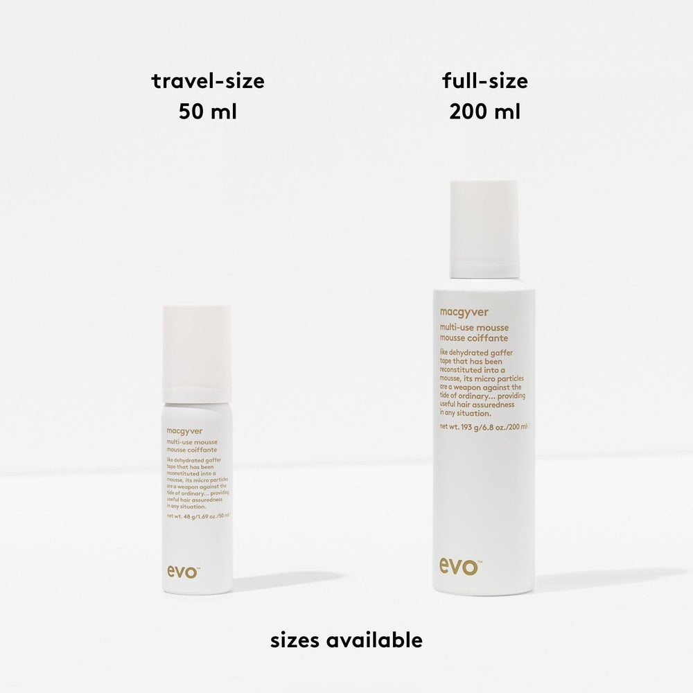 EVO Macgyver bottle next to hand to show size and easy-grip scale
