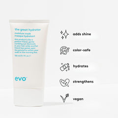 EVO hand applying mask to wet hair, demonstrates easy application and slip