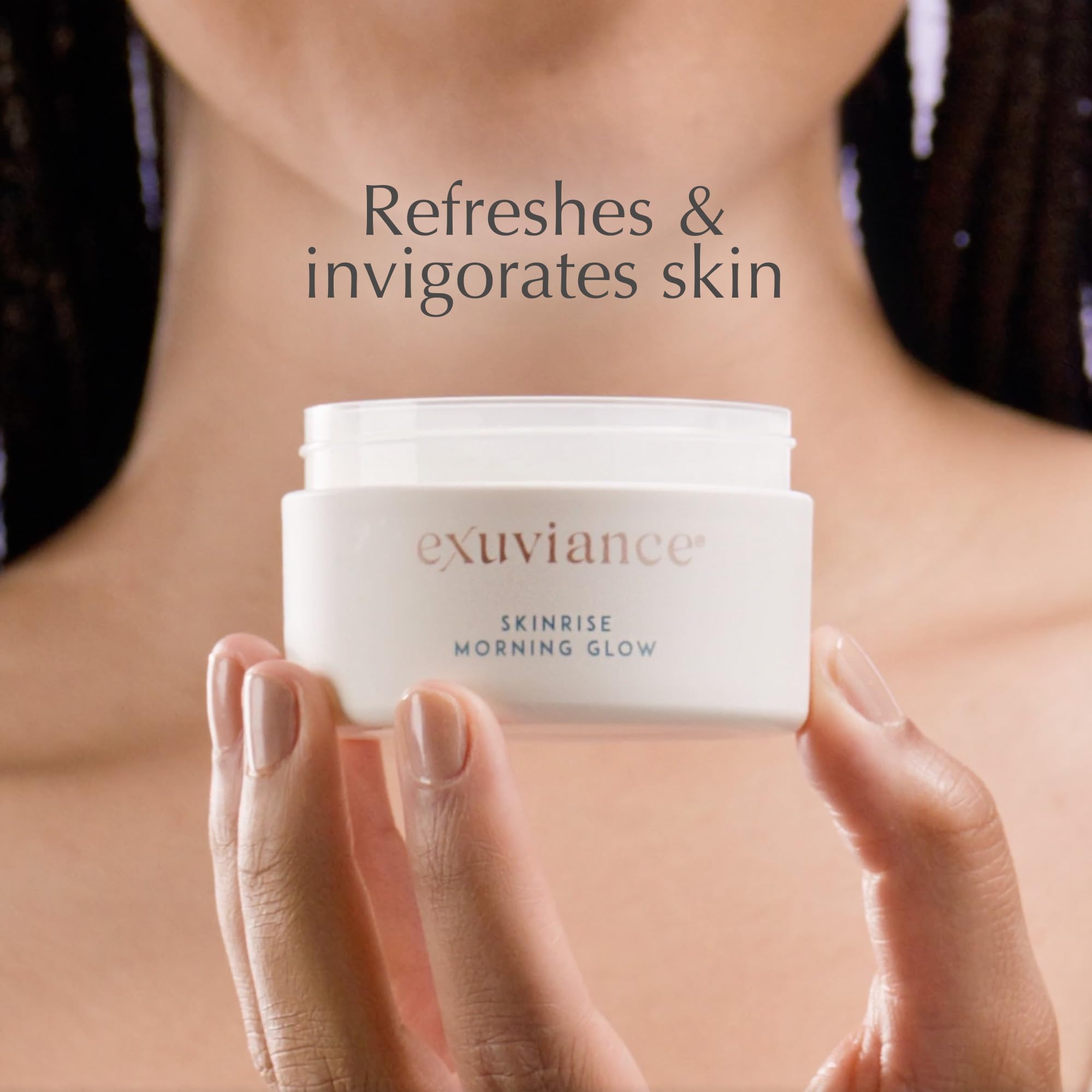EXUVIANCE glowing cheek after use illustrating hydrated, radiant skin